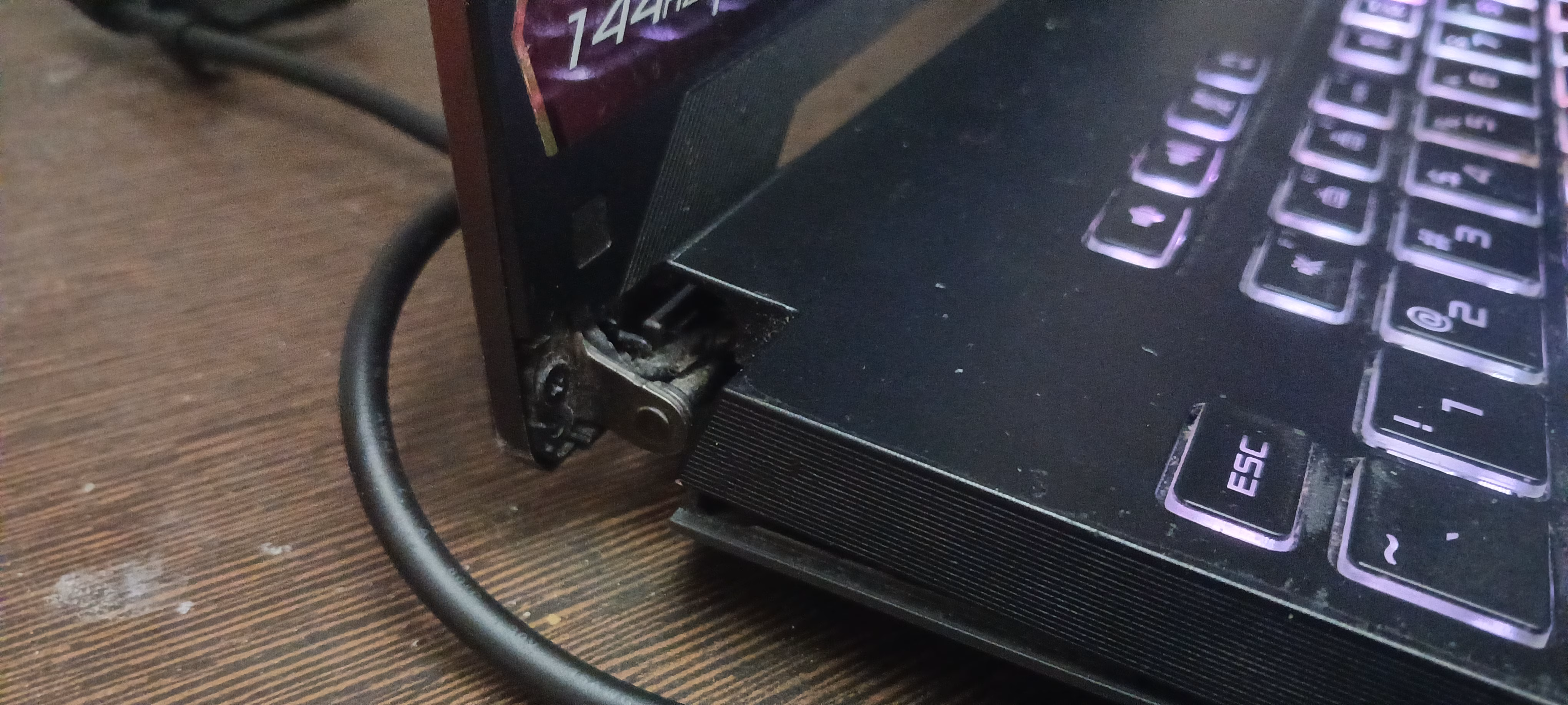 My broken hinge bracket cover